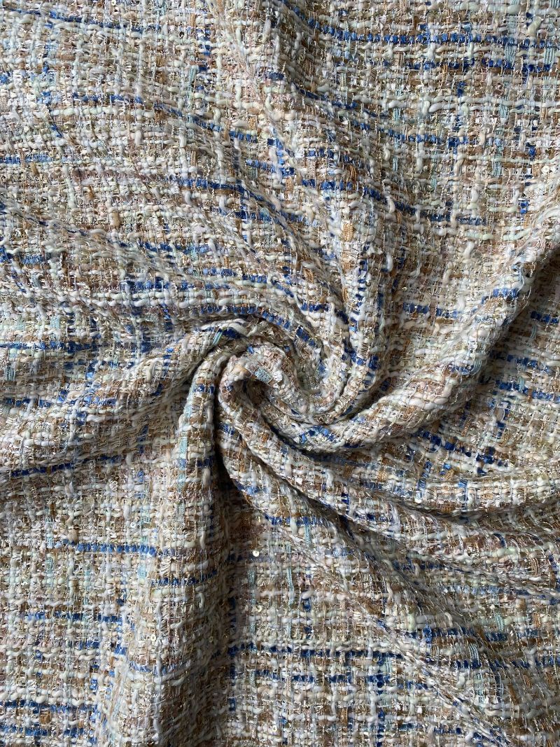 A beige and blue tweed fabric