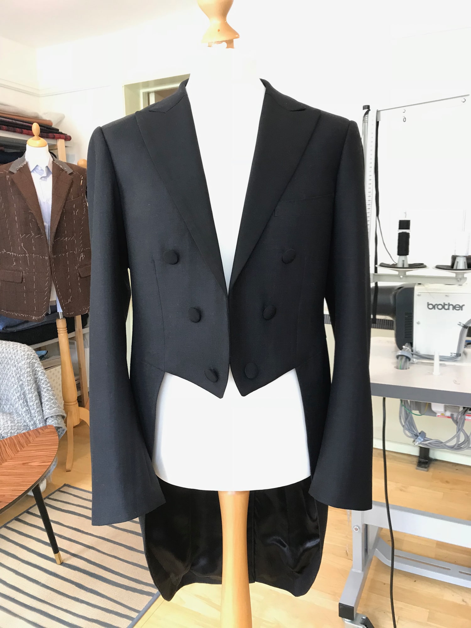 A black suit on a mannequin