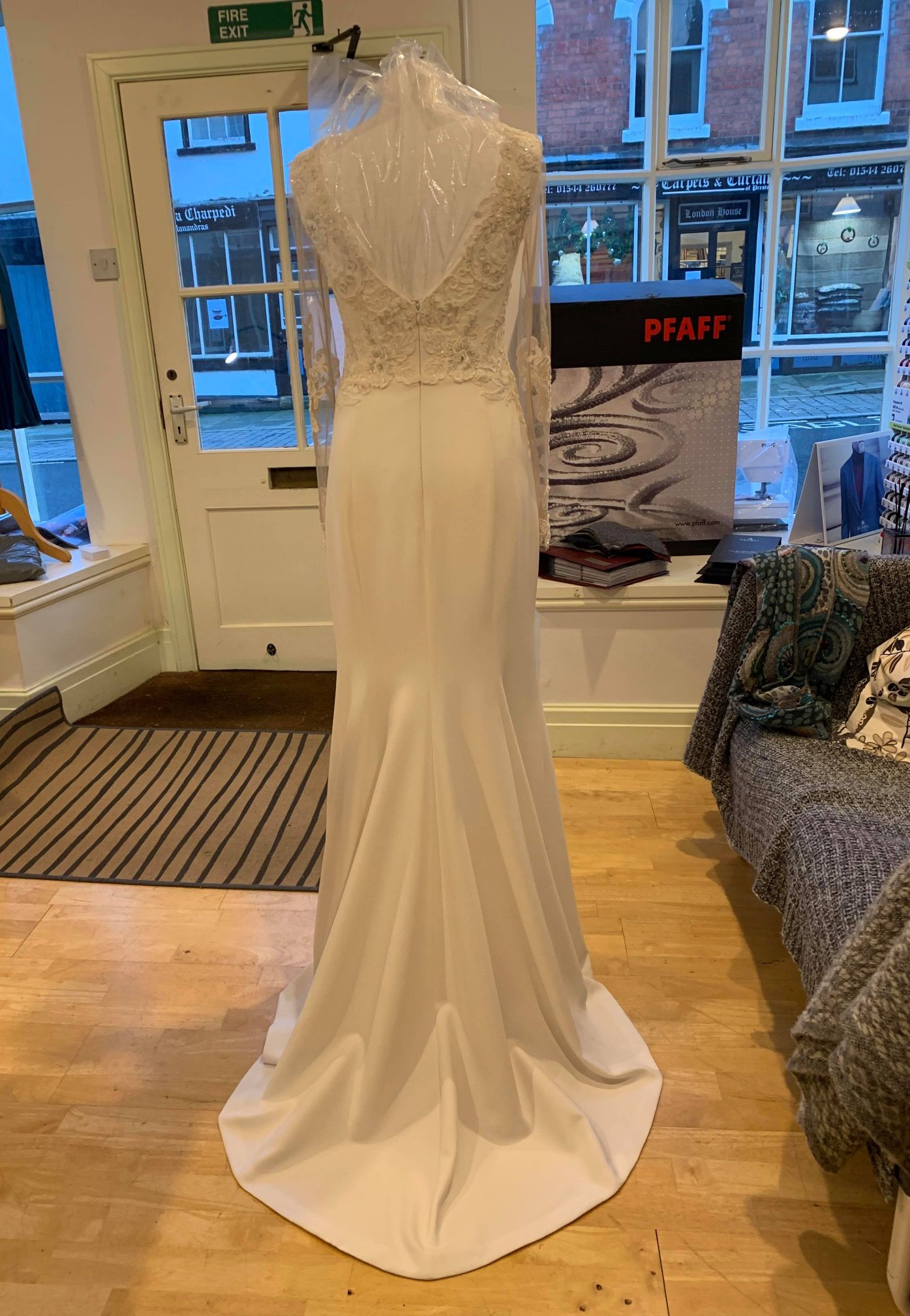 A white wedding dress on a mannequin