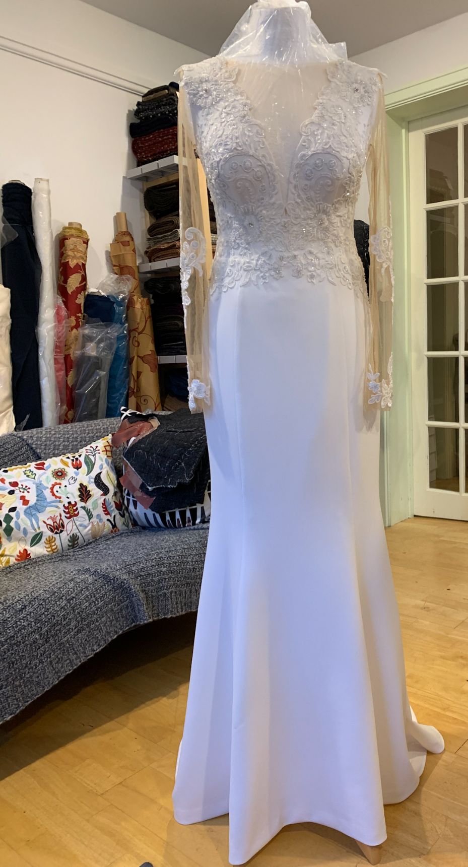 A white wedding dress in Ellie's store